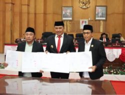 Pj. Bupati Batu Bara Mengesahkan Anggaran Pendapatan Dan Belanja Daerah.(APBD) TA 2025 SebesarRp 1,299 tr.