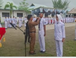 Kepsek SMK Negeri 1 Talawi Gelar Pelantikan Taruna Dan Taruni Angkatan Ke XIX di Lapangan.Sangat Media.