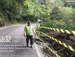 Ditengah Cuaca Tak Menentu,Polres Simalungun Himbau Waspadai Lokasi Longsor dan Pohon Tumbang Lintas Parapat 