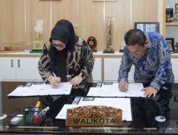 Wesly Tandatangani MoU Jaminan Sosial Ketenagakerjaan bagi Pekerja Rentan di Pematangsiantar